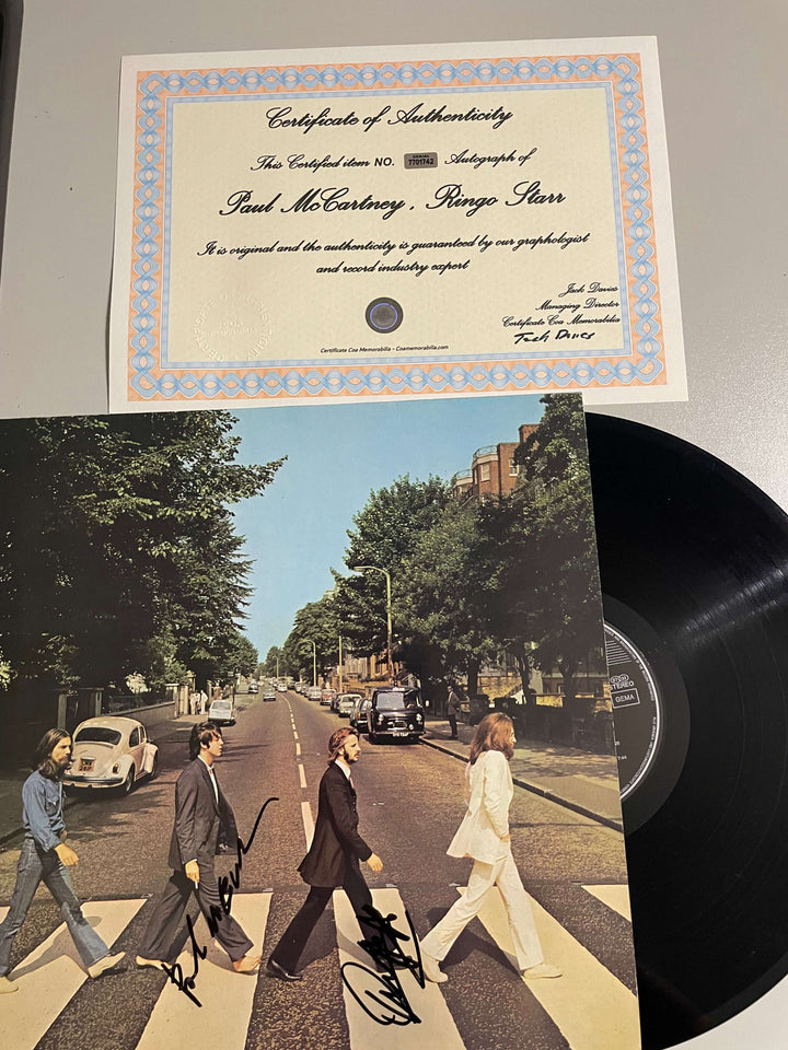 LP de The Beatles "Abbey Road" de 1995, firmado por Paul McCartney y Ringo Starr