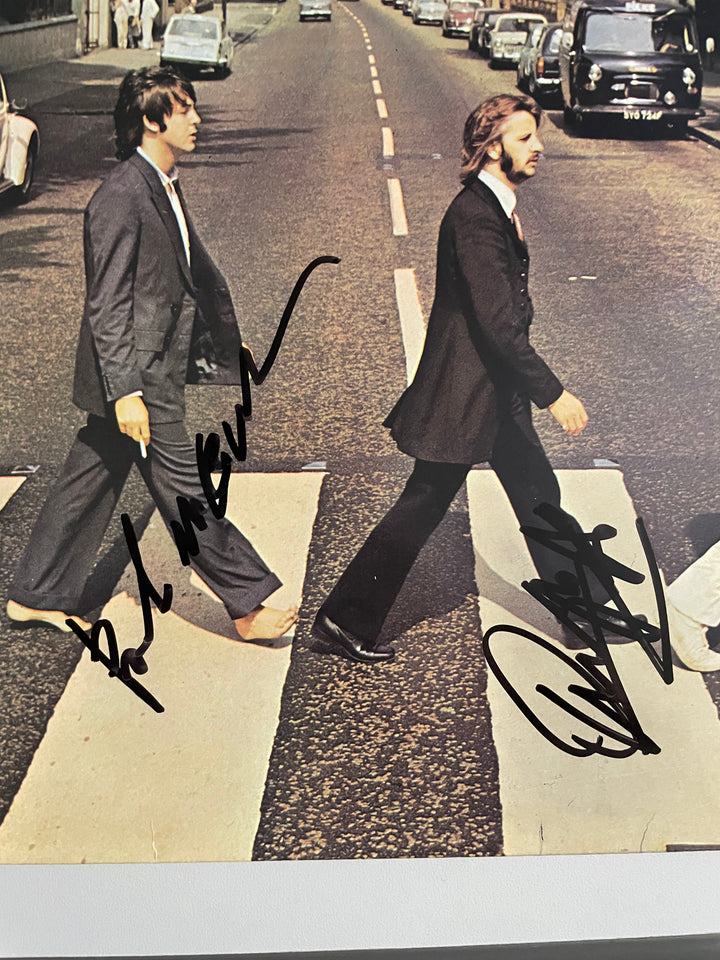 LP de The Beatles "Abbey Road" de 1995, firmado por Paul McCartney y Ringo Starr