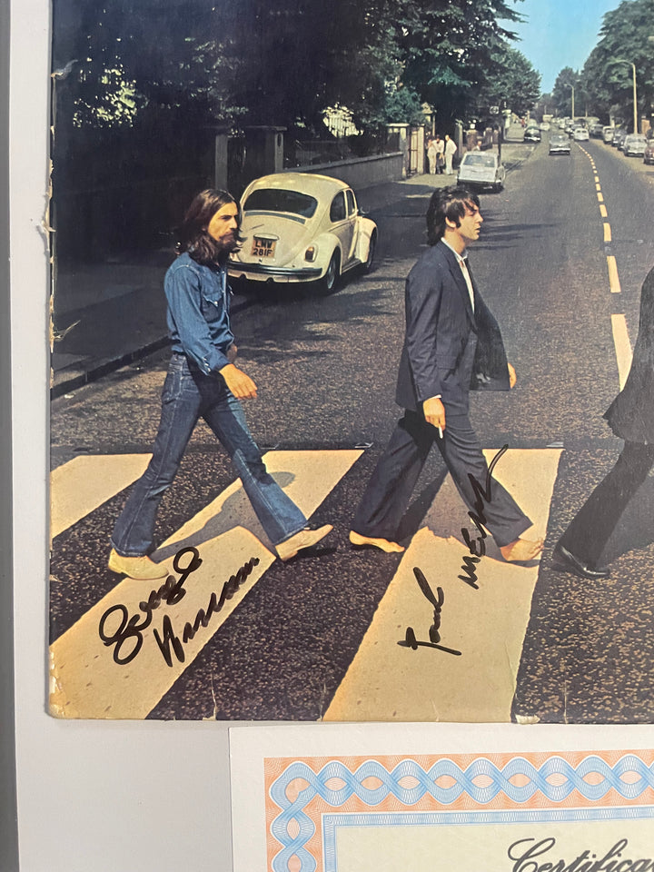 The Beatles Abbey Road 1995 LP - Signed by John Lennon George Harrison Paul McCartney and Ringo Starr