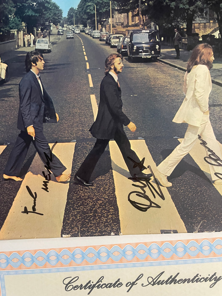 The Beatles Abbey Road 1995 LP - Signed by John Lennon George Harrison Paul McCartney and Ringo Starr