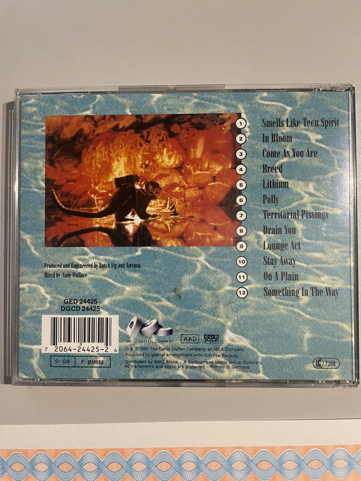 Nirvana - "Nevermind" CD 1991 - Autographed by Kurt Cobain, Dave Grohl, and Krist Novoselic + COA