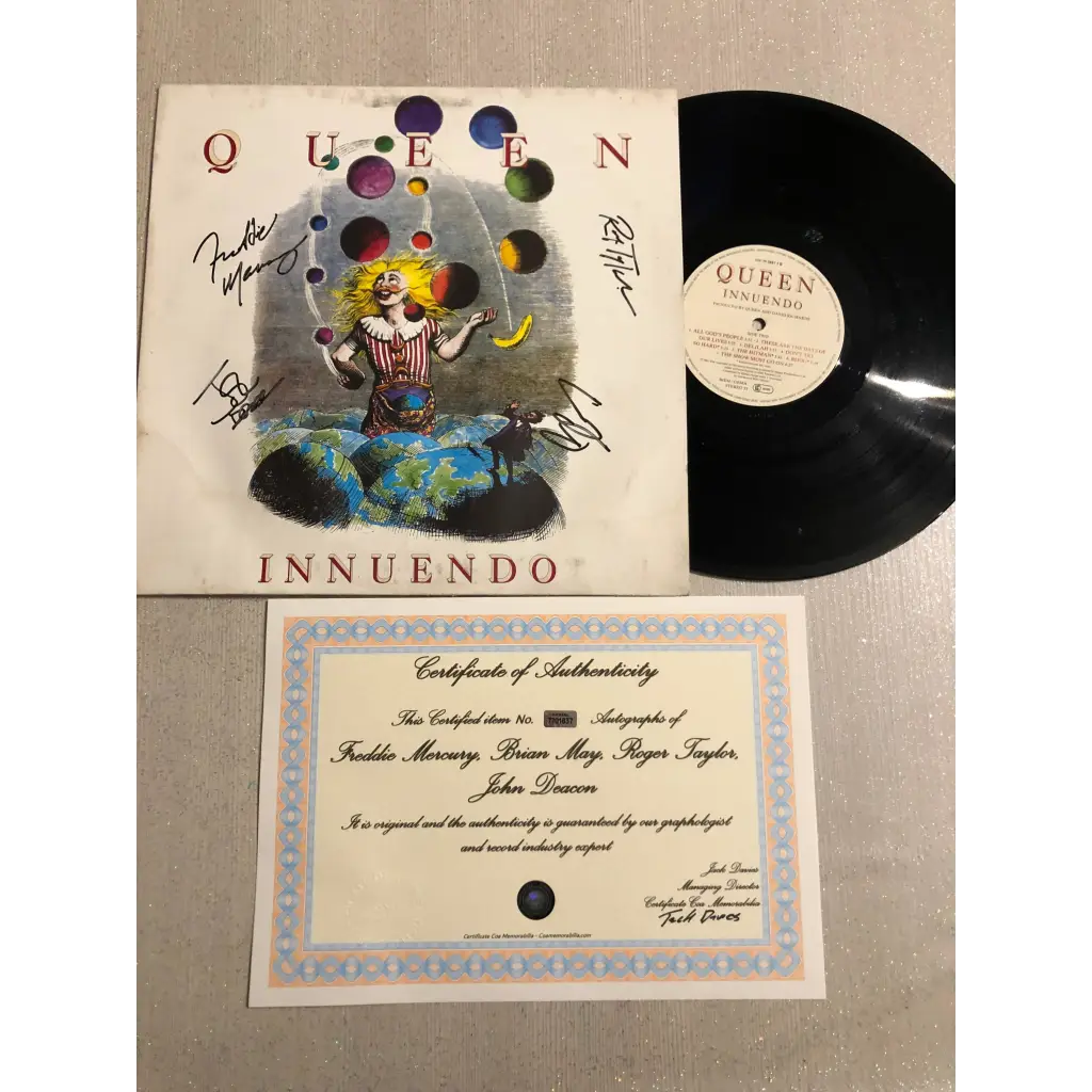 Queen Innuendo Autographed Album, LP Queen Innuendo Autographed by Freddie Mercury, Brian May, John Deacon and Roger Taylor 1991 + Certificate COA
